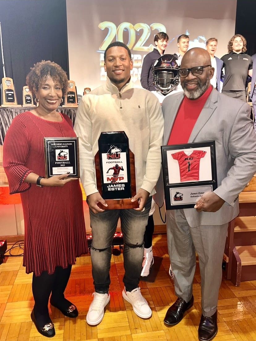 NIU Football Player holding Mini Jersey Plaque